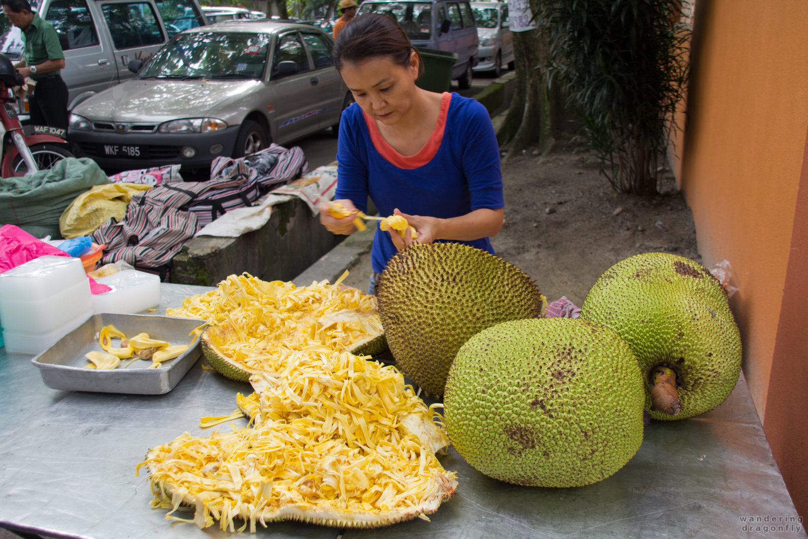 Preparing jackfruit for sale -- jackfruit, marketplace