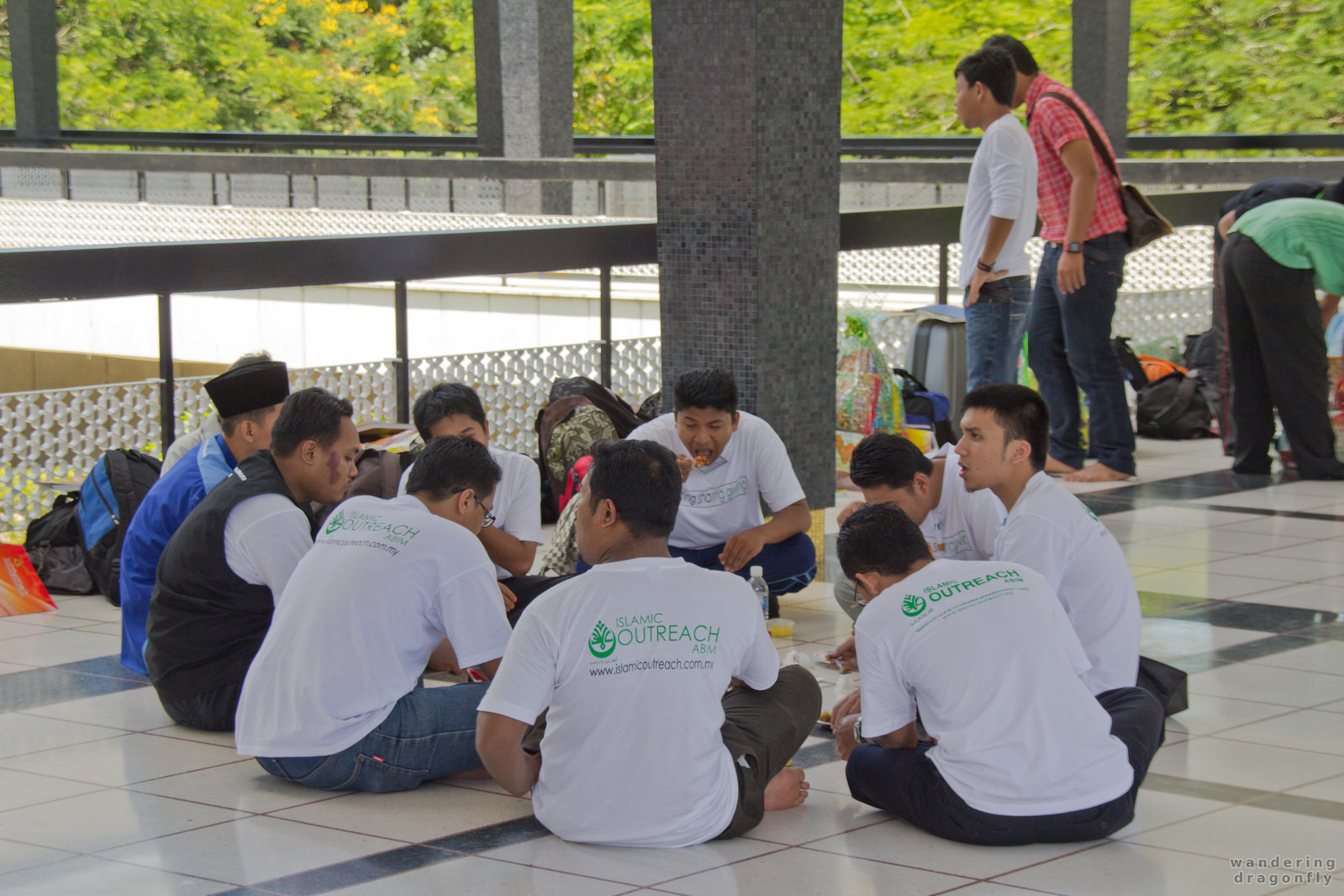 Islamic Outreach members having a lunch -- eating, mosque