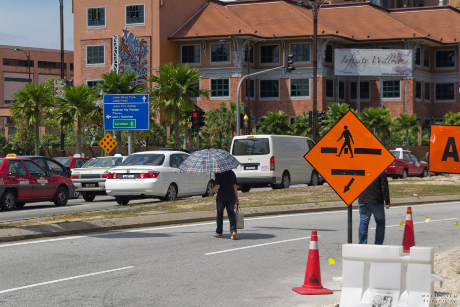 No sidewalk here -- street, traffic