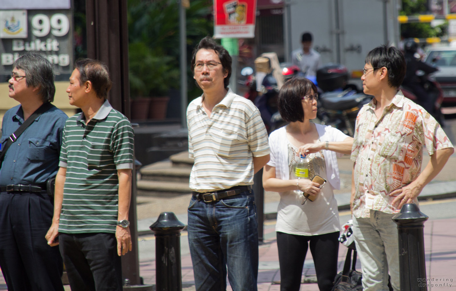 Waiting for the lights -- people, street