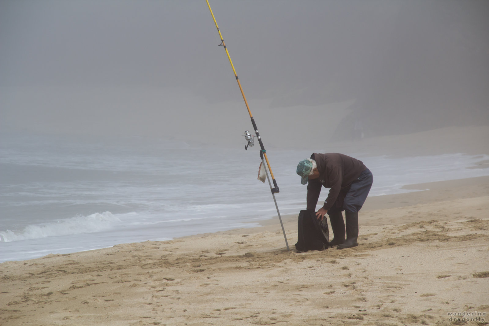 Is foggy weather better for fishing? -- angler, fishing rod, fog
