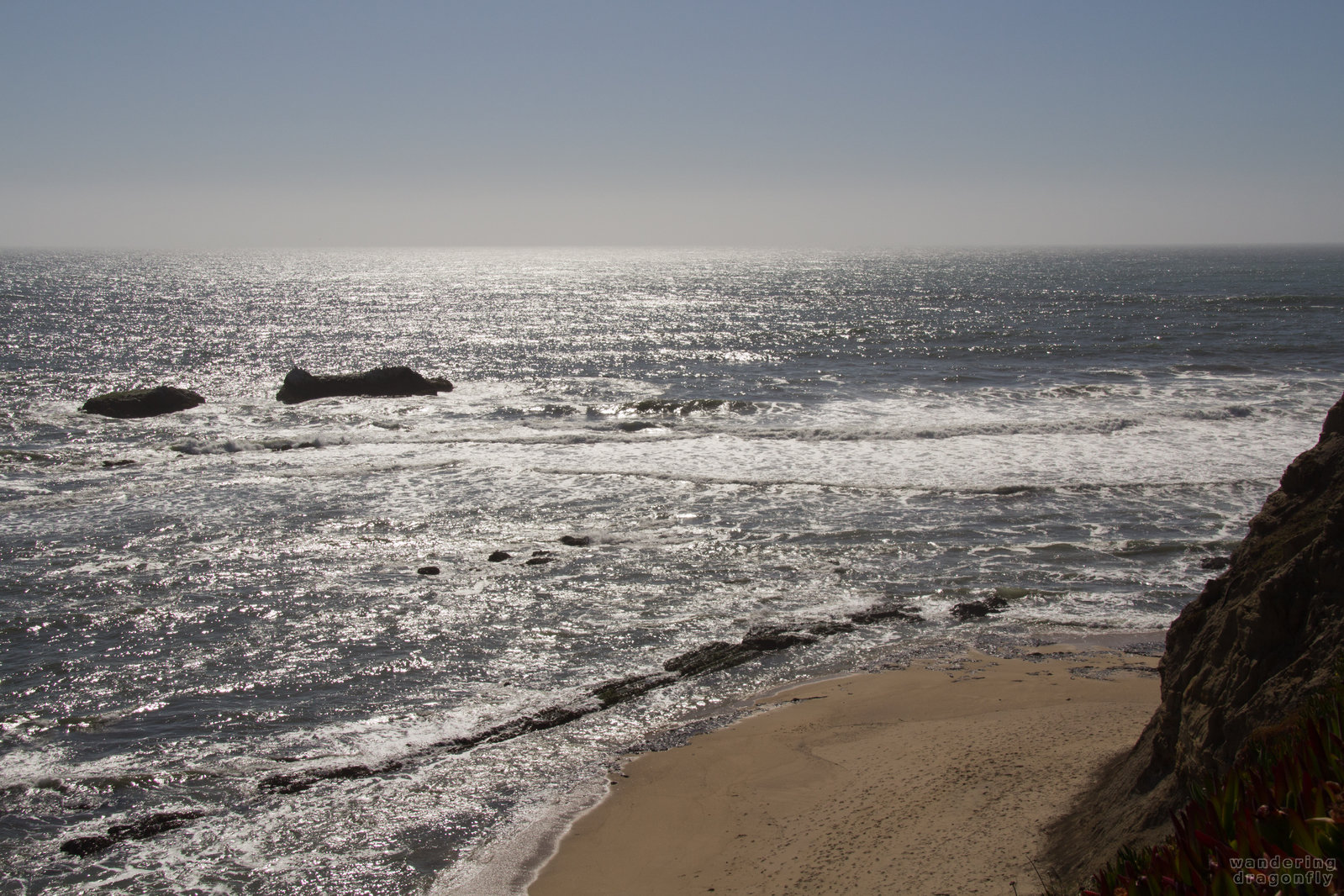 Shiny reflections -- beach, ocean, sand, sunlight