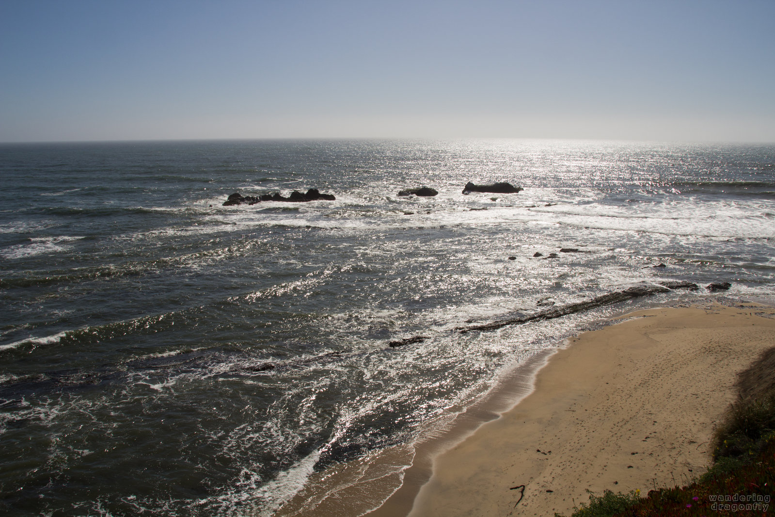 Shiny reflections -- beach, ocean, sand, sunlight