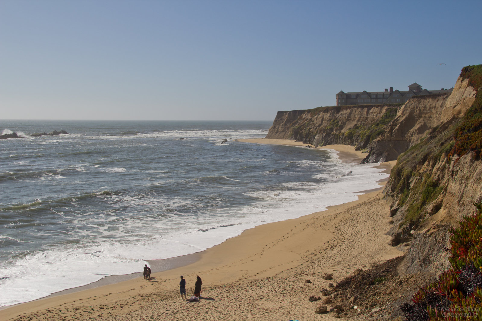 Sunny afternoon on the beach -- beach, ocean, people, rock, sand, vista