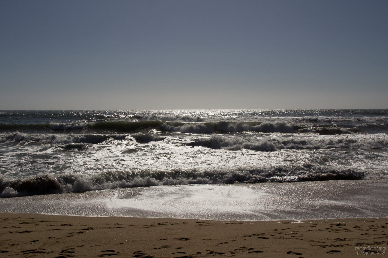 Shiny reflections -- beach, ocean, sand, sunlight, wave