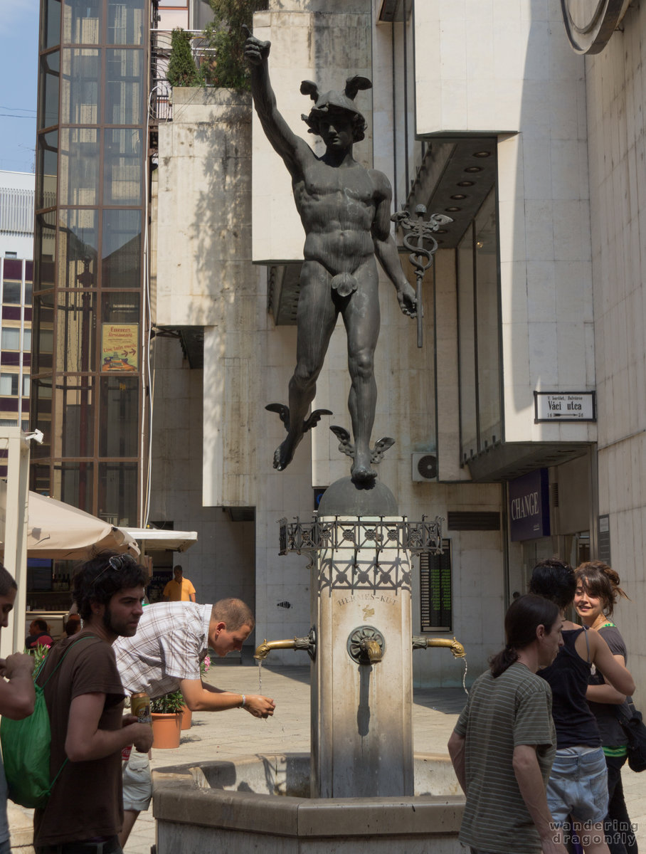 Hermes Well -- statue, tourist, well