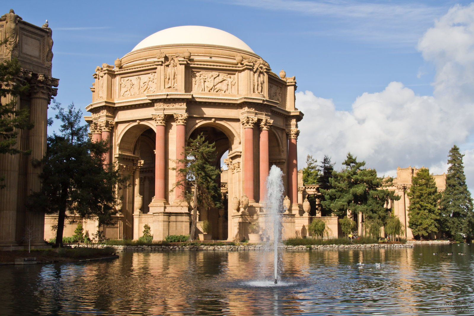 Fountain of the lagoon -- building, fountain, pillar, pond, sculpture, tree