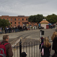 This cable car turntable is at the Hyde St - Beach St intersection. The long queue of people consists of tourists who want to ride the cable car.

The two Powell Street lines (Powell-Hyde & Powell-Mason) use  cable cars that are operable from only one end. They thus require turntables to reverse direction at the ends of the line.

Mrs. Friedel Klussmann, the Cable Car Lady, led the campaign that saved the San Francisco cable cars in the late 1940's.