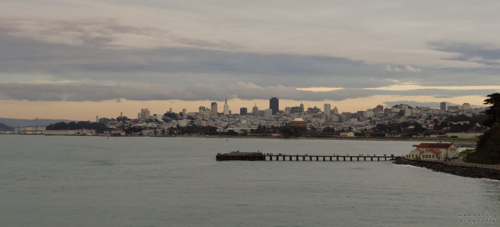 San Francisco in twilight -- building, city, pier, water