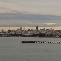 As seen from Fort Point.

On the picture one can find the dome of the Palace of Fine Arts, the pinnacle of the Transamerica Pyramid, the Coit Tower and the pillars of the Bay Bridge.