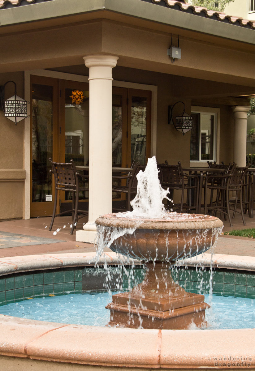 Fountain with the clubhouse -- building, fountain