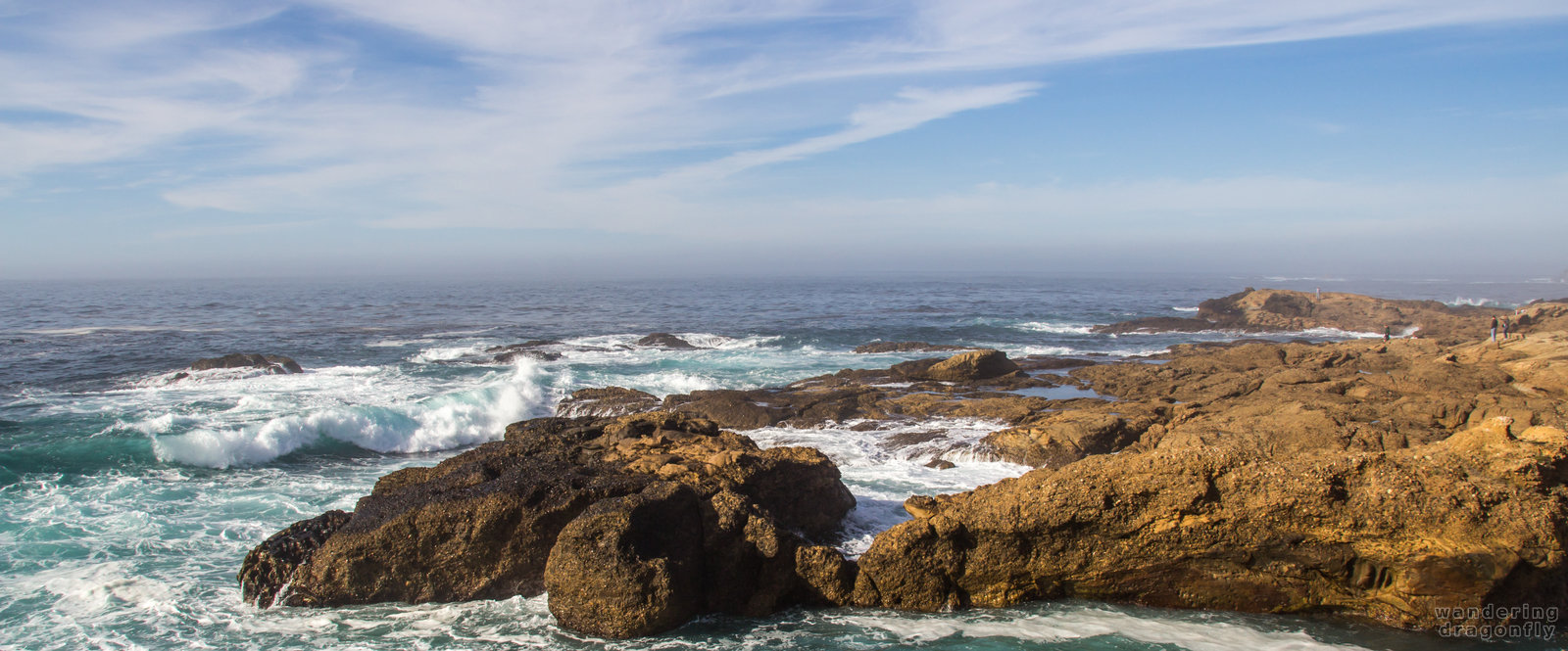 Slurring horizon -- cliff, ocean, rock, sky, water, wave