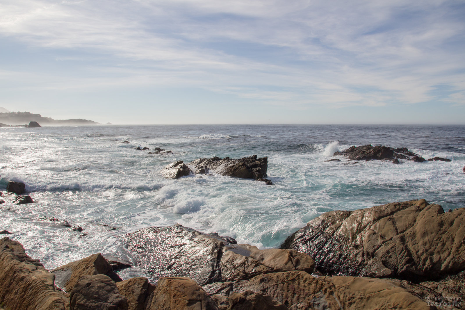 Magnificent ocean view -- cliff, ocean, rock, sky, turquoise water, wet cliff