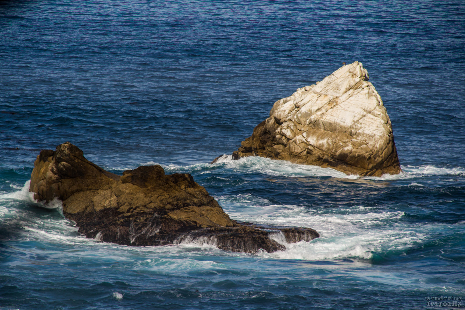 Cliffs in the water -- cliff, ocean, rock, water