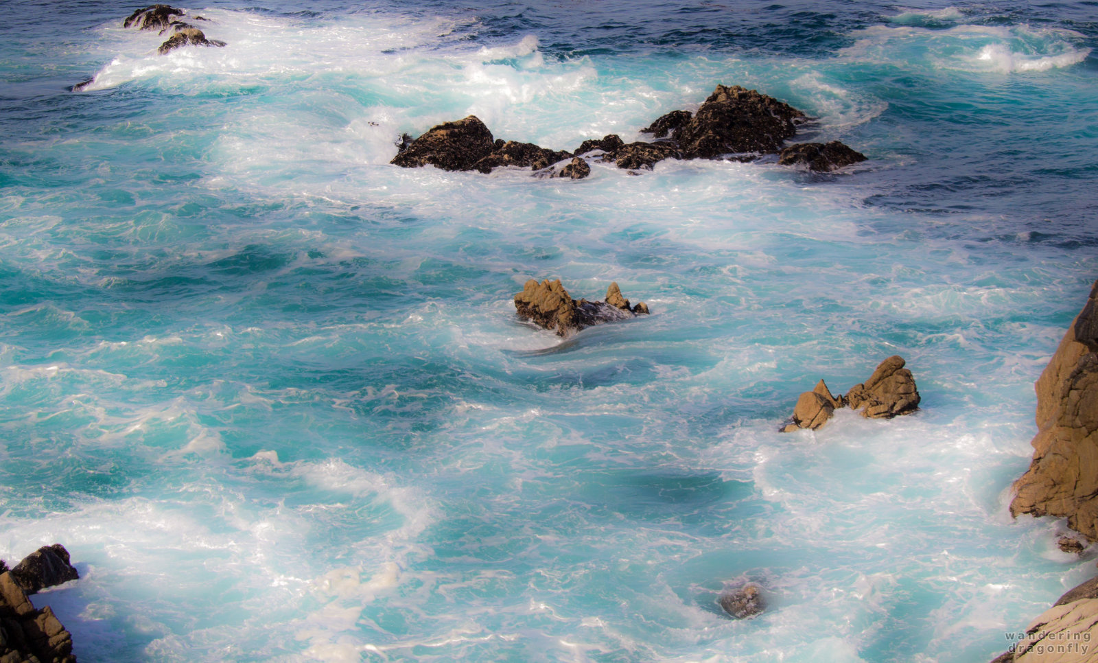 Turquoise foam -- ocean, rock, turquoise water