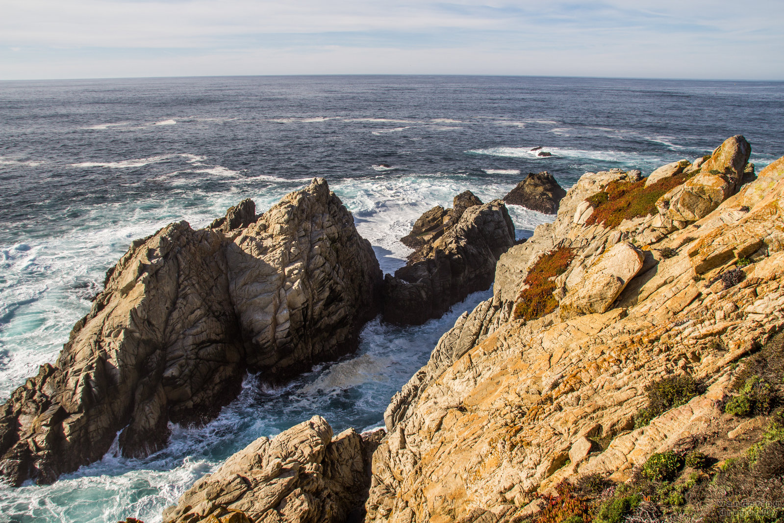 Golden cliffs around The Pinnacle -- cliff, gold, ocean, rock, water