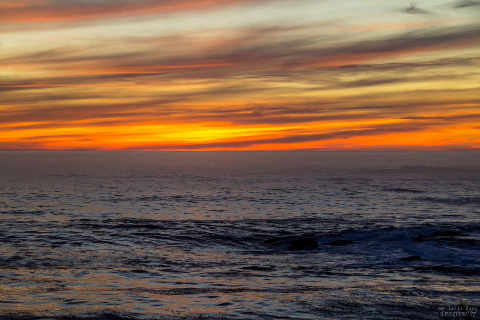 Whirlpool after sunset -- cloud, ocean, rock, sun, sunset, water, wave
