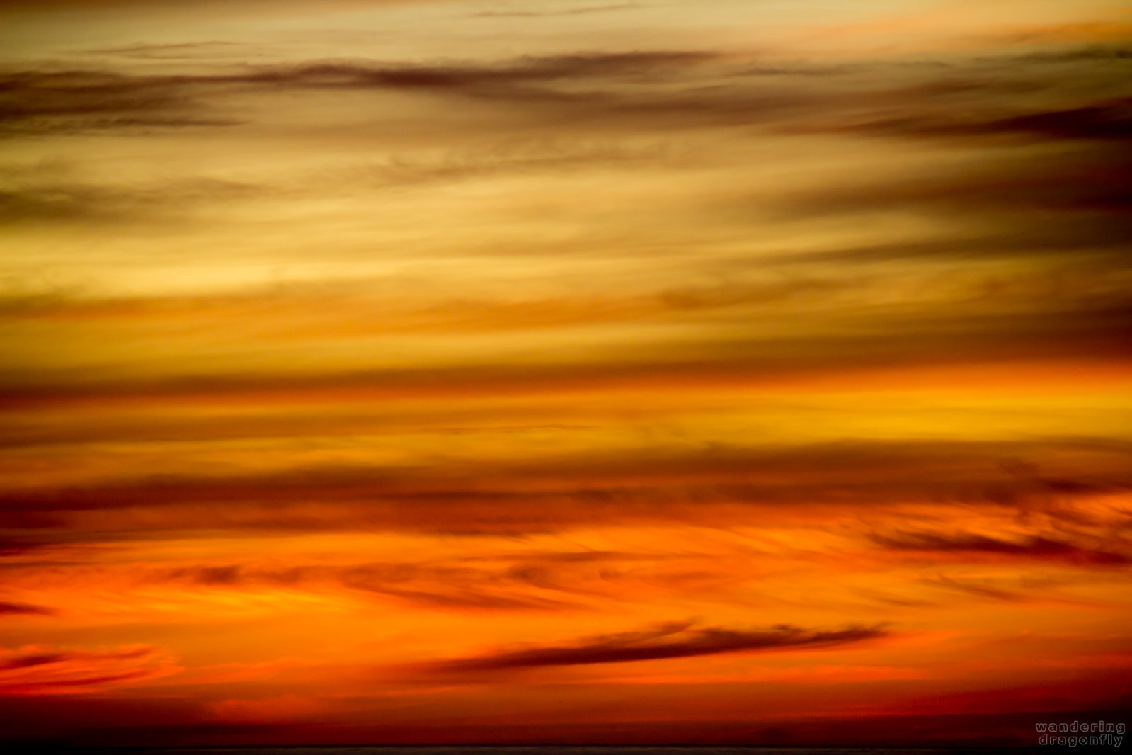 Sunset colors -- cloud, orange, red, stripes, sunset, yellow