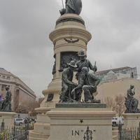The figure of Eureka at the top of the Pioneer Monument, with 'forty-niners' in the foreground.