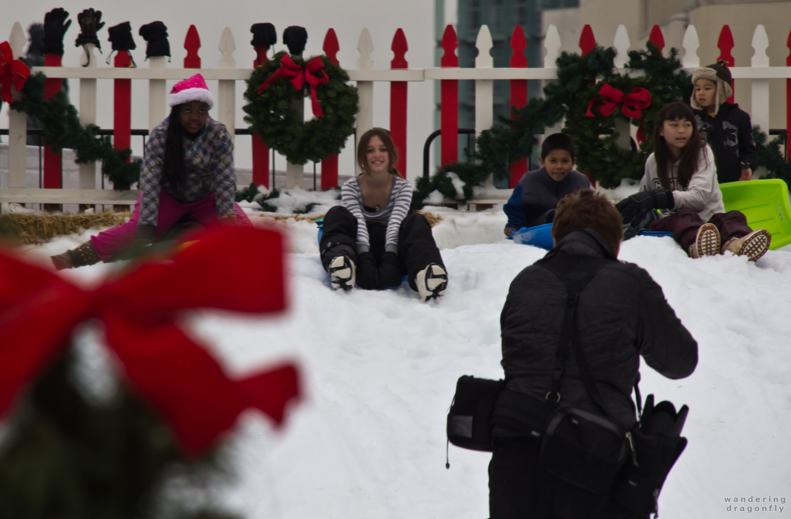 Eager for the ride ... -- children, playing, slope, snow