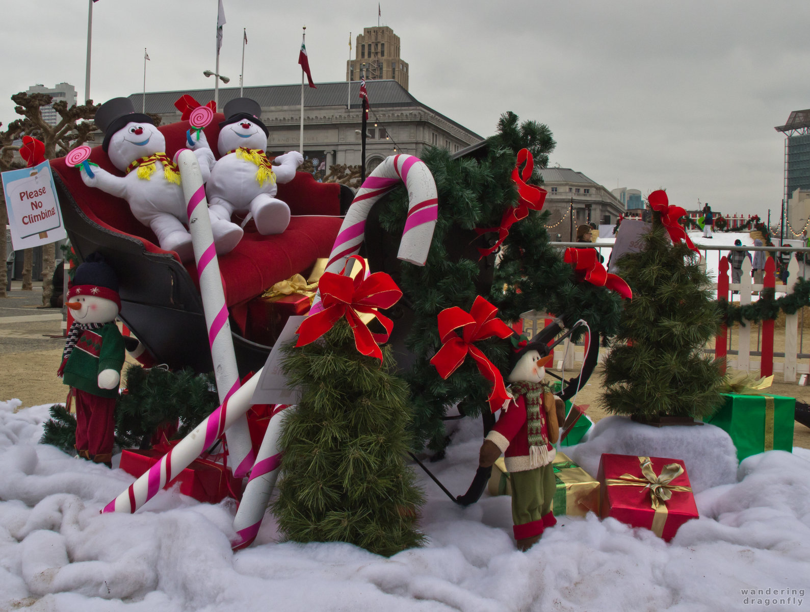 Breaking news: snowmen armed with lollipopps occupied Santa's sleigh -- christmas decoration