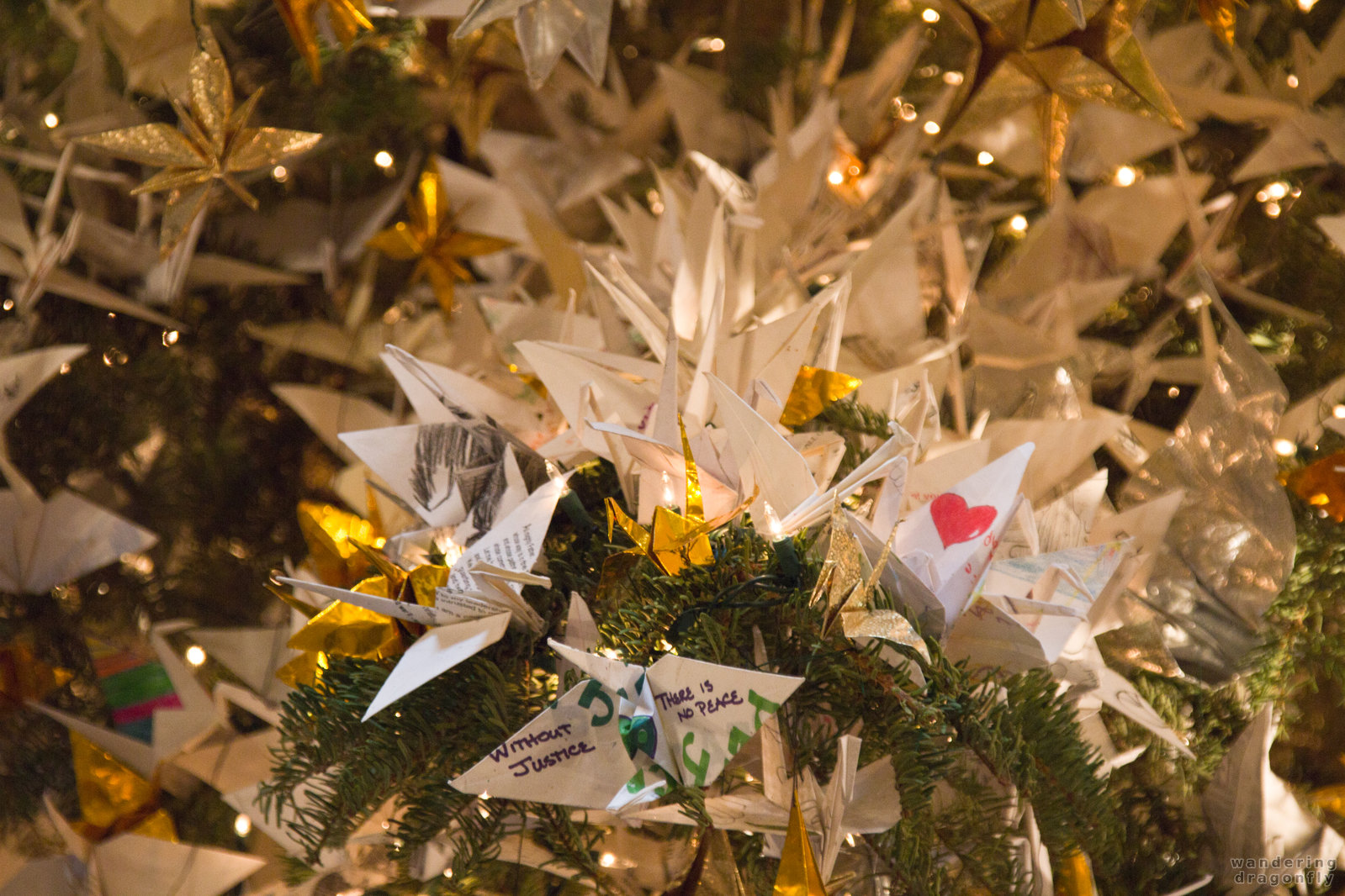 Pine branch thick with cranes -- christmas tree, open letter, wish