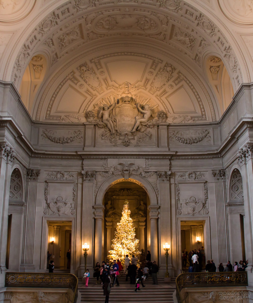 Shrine of the tree -- christmas tree, lamp, people, stairs