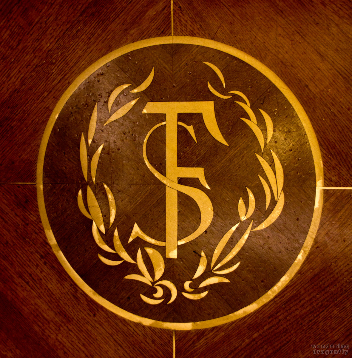 Inlay crest in the elevator -- art, decoration