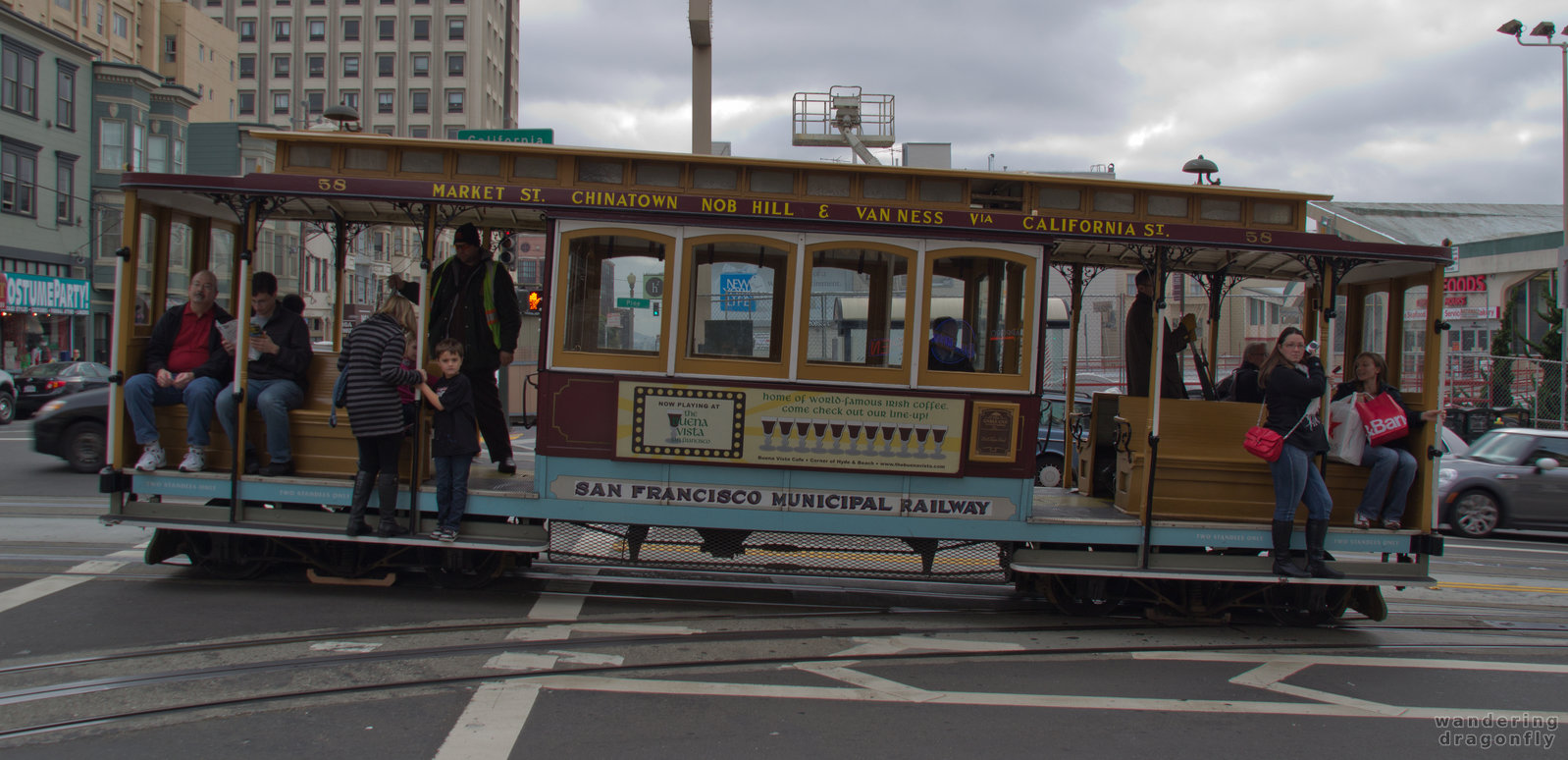 Cable car of California Street -- cable car, people, street