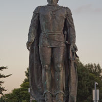 Cristoforo Colombo was born in 1451 in Genoa which is part of the present-day Italy. Although he wasn't the first explorer to reach the Americas, his four voyages across the Atlantic Ocean led to the first lasting European contact with the 