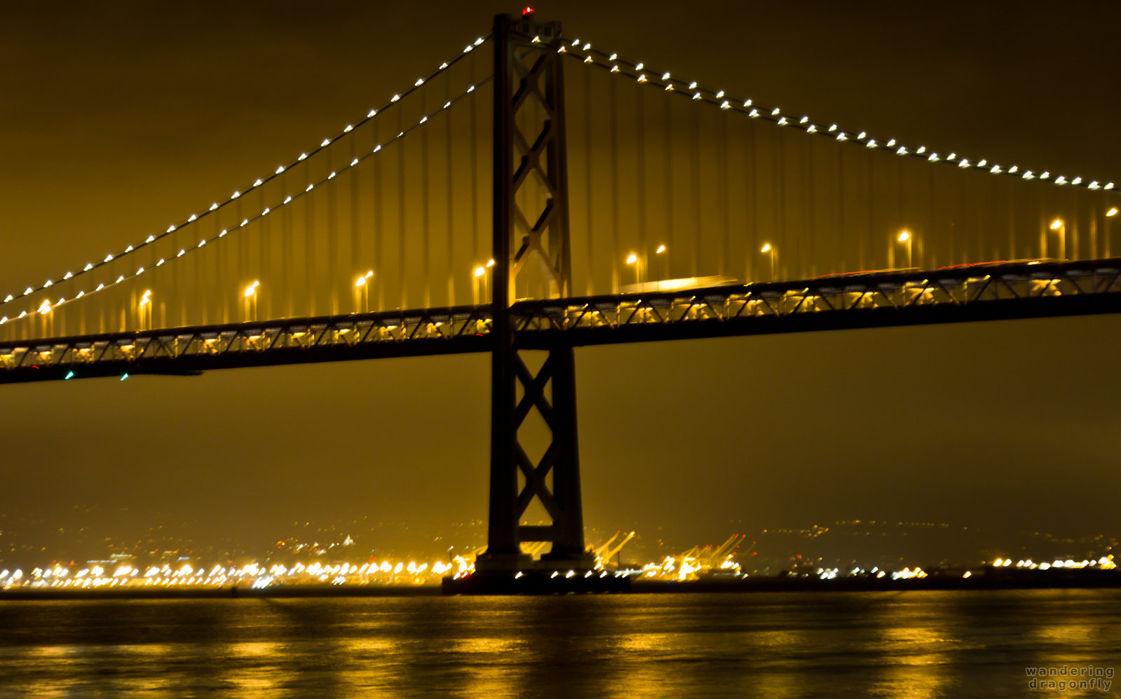 Lonely pillar of the Bay Bridge -- bridge, night