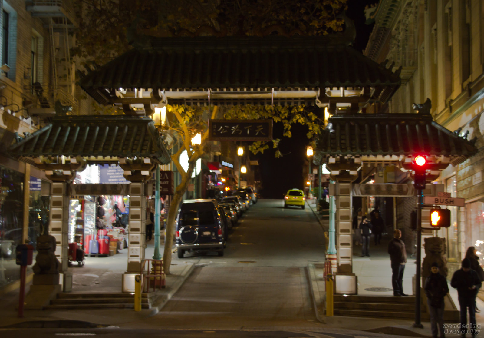 Chinatown's Dragon Gate at night -- gate, street