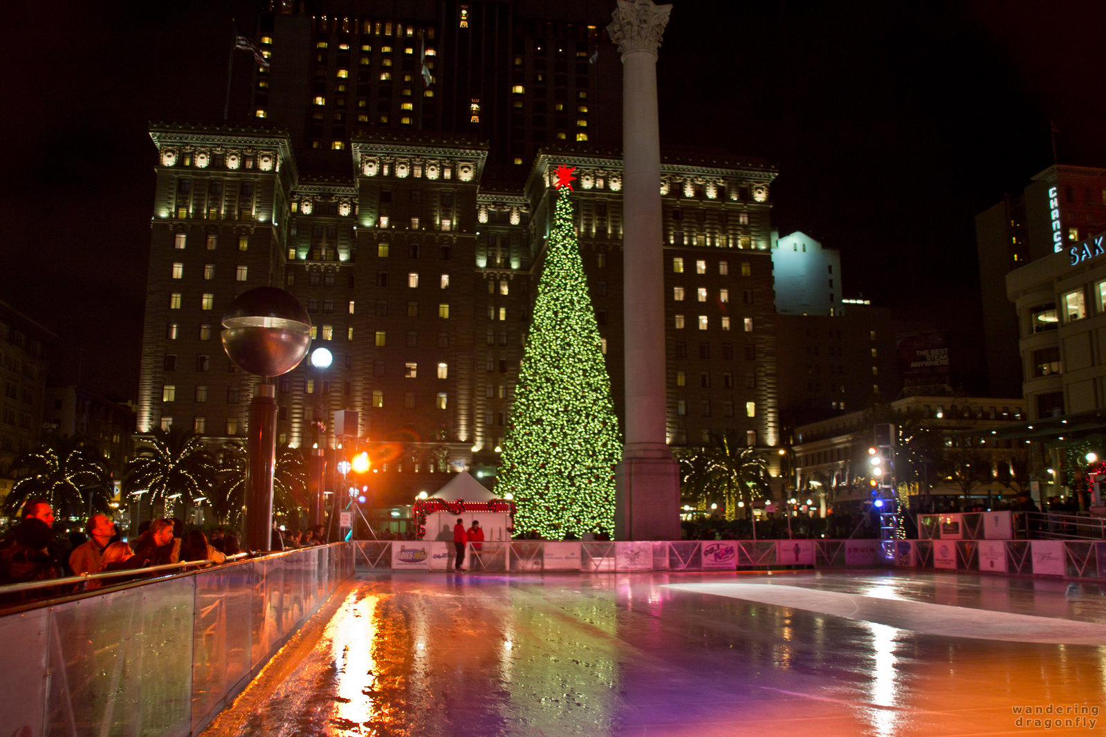 Christmas at Union Square -- building, christmas tree, lighting, night, skating ring